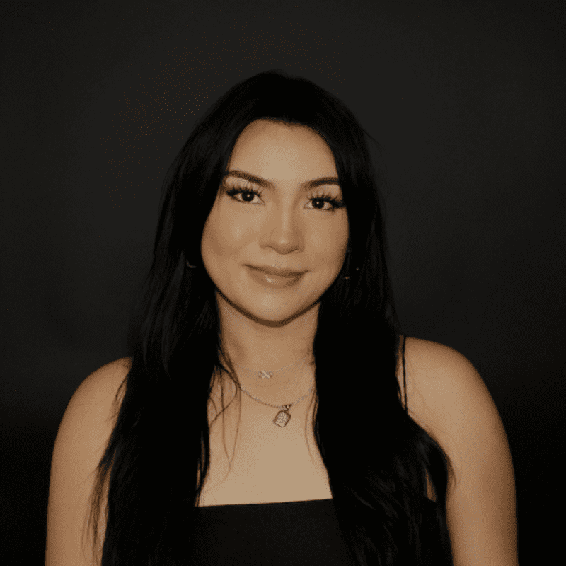 Portrait of Anna Le, a professional stylist at Educe Salon, showcasing their expertise and style.