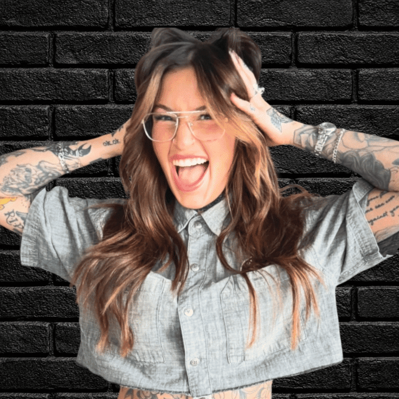 Portrait of Shannon McGraw, a professional stylist at Educe Salon, showcasing their expertise and style.