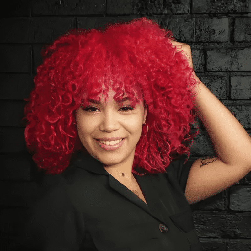 Portrait of Jessica Alvelo, a professional stylist at Educe Salon, showcasing their expertise and style.